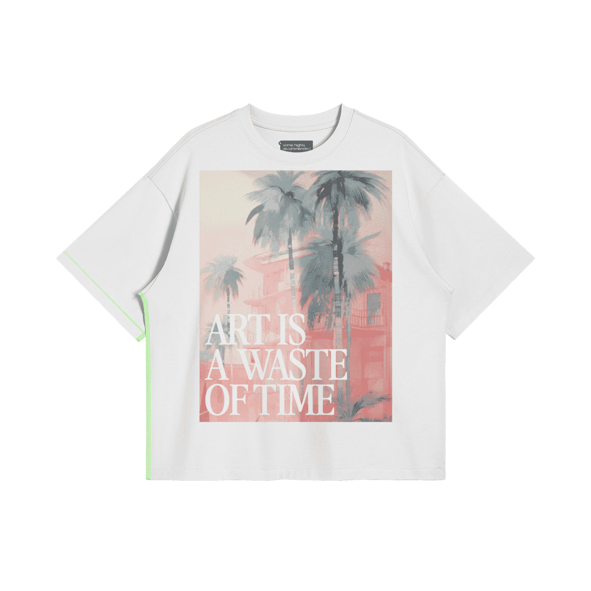 White oversized T-shirt featuring tropical palm artwork with text Art is a waste of time. Perfect for young fashion lovers with bold attitude. Modern aesthetics